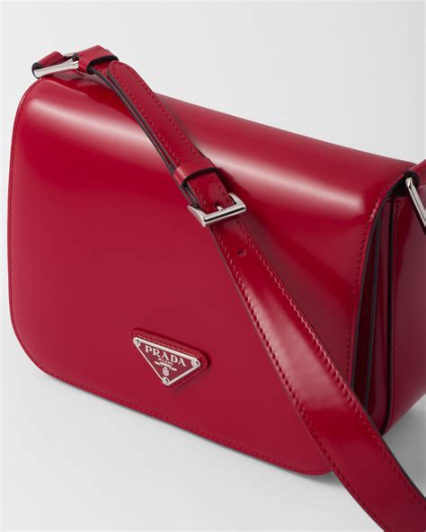 prada shoulder bag dinosaur|Prada shoulder bag resale.